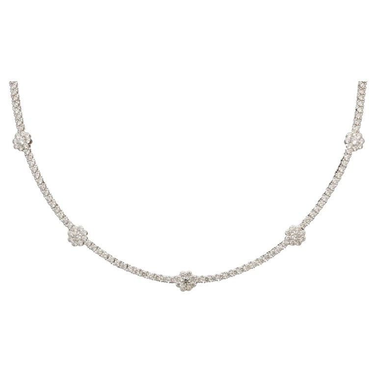 https://a.1stdibscdn.com/flower-diamond-tennis-necklace-for-sale/j_415/j_216141721705596897076/j_21614172_1705596898259_bg_processed.jpg?width=768