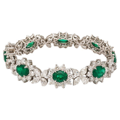 https://a.1stdibscdn.com/emerald-and-diamond-bracelet-for-sale/j_415/j_224079721711375670124/j_22407972_1711375671331_bg_processed.jpg?width=768