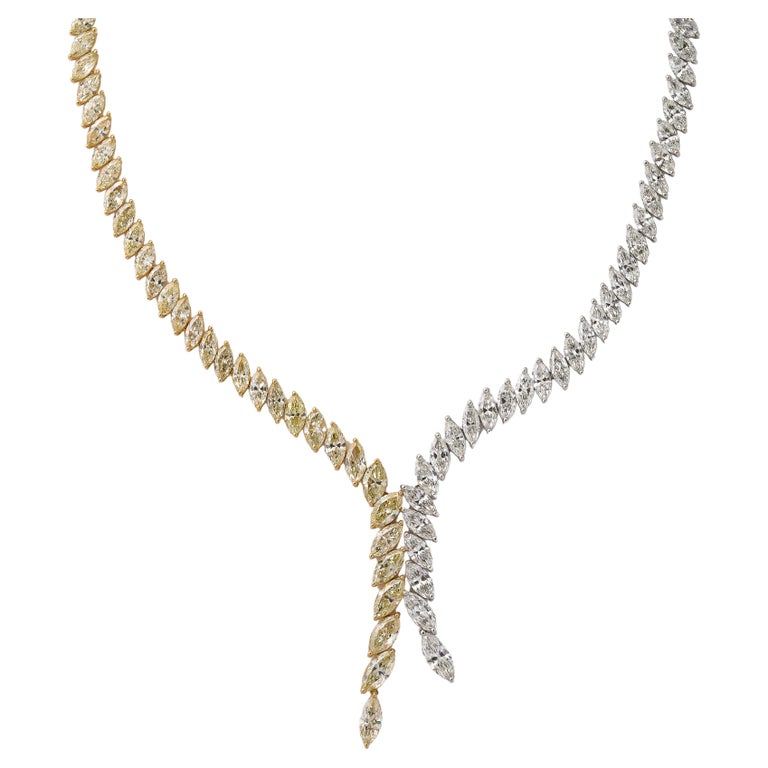 https://a.1stdibscdn.com/yellow-and-white-diamond-marquise-necklace-for-sale/j_415/j_225040021712330427103/j_22504002_1712330428452_bg_processed.jpg?width=768