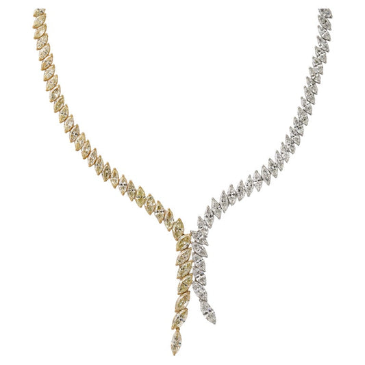 https://a.1stdibscdn.com/yellow-and-white-diamond-marquise-necklace-for-sale/j_415/j_225040021712330427103/j_22504002_1712330428452_bg_processed.jpg?width=768