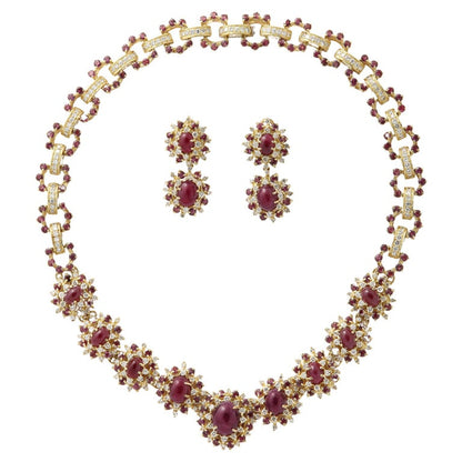 https://a.1stdibscdn.com/ruby-and-diamond-necklace-and-earring-set-for-sale/j_415/j_229927221717077925683/j_22992722_1717077926994_bg_processed.jpg?width=768