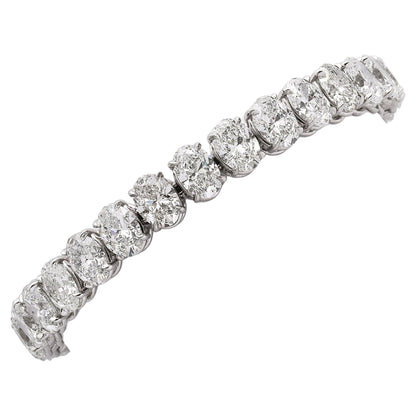 https://a.1stdibscdn.com/oval-diamond-tennis-bracelet-for-sale/j_415/j_232203621718979996847/j_23220362_1718979997677_bg_processed.jpg